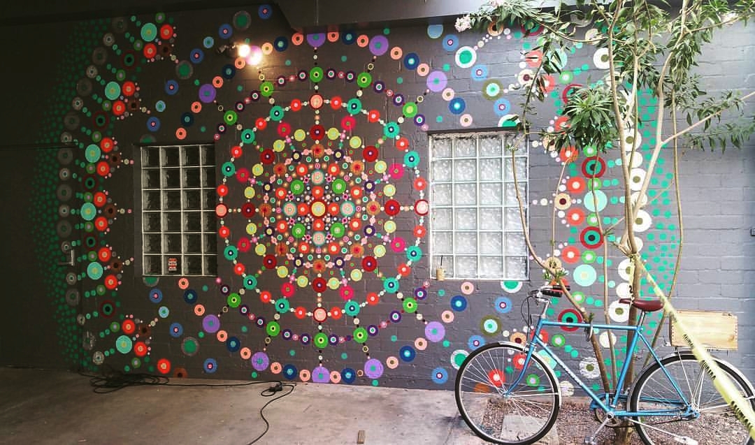 photo of the radial convergence mural by kyllan maney at the monorchid in downtown phoenix