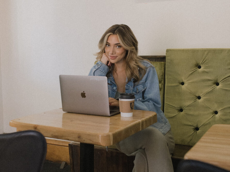 Girl in Coffee shop on laptop